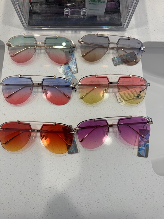 Accessories - Glo rimless Aviators Sunglasses.